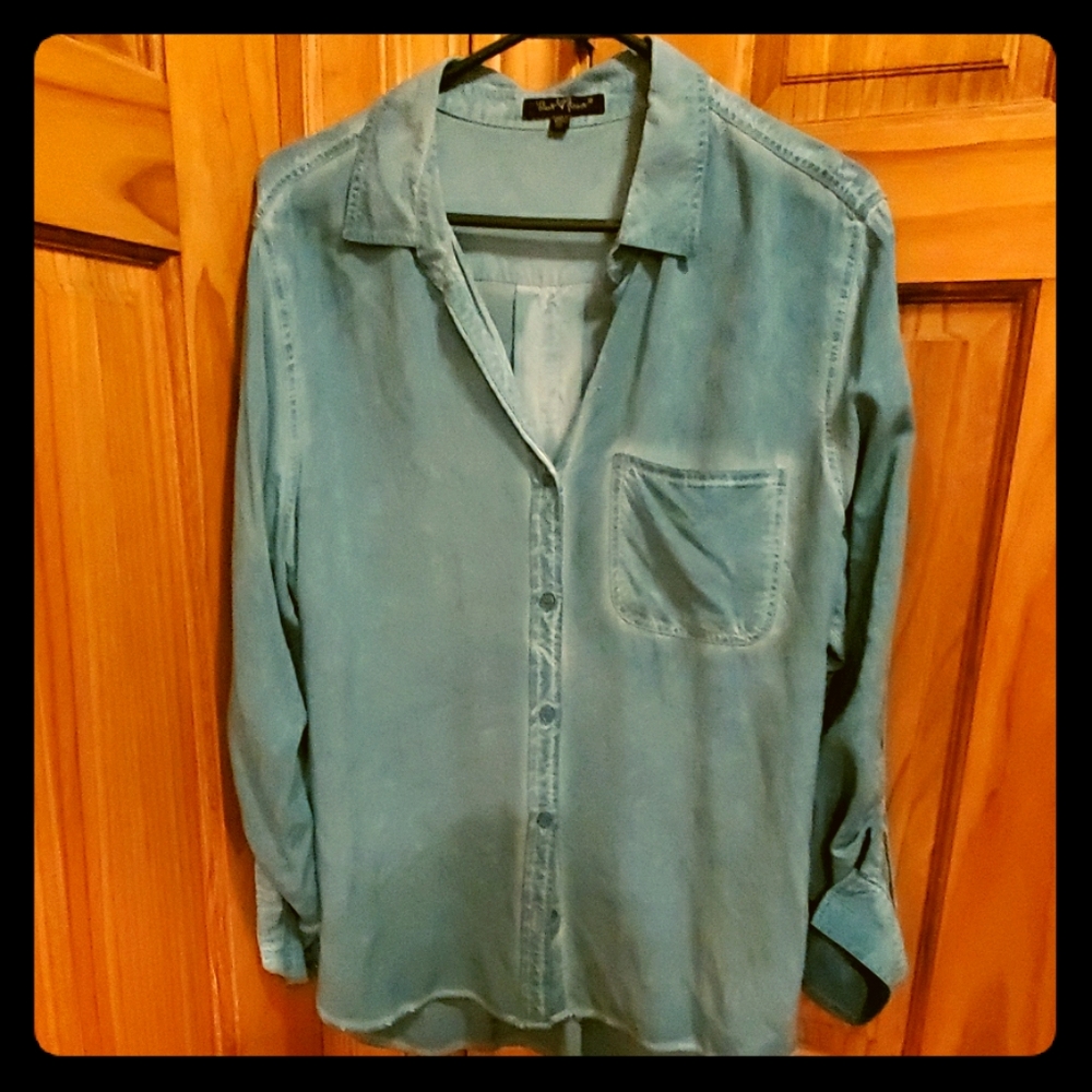 Turquoise or aquaish color super soft blouse.